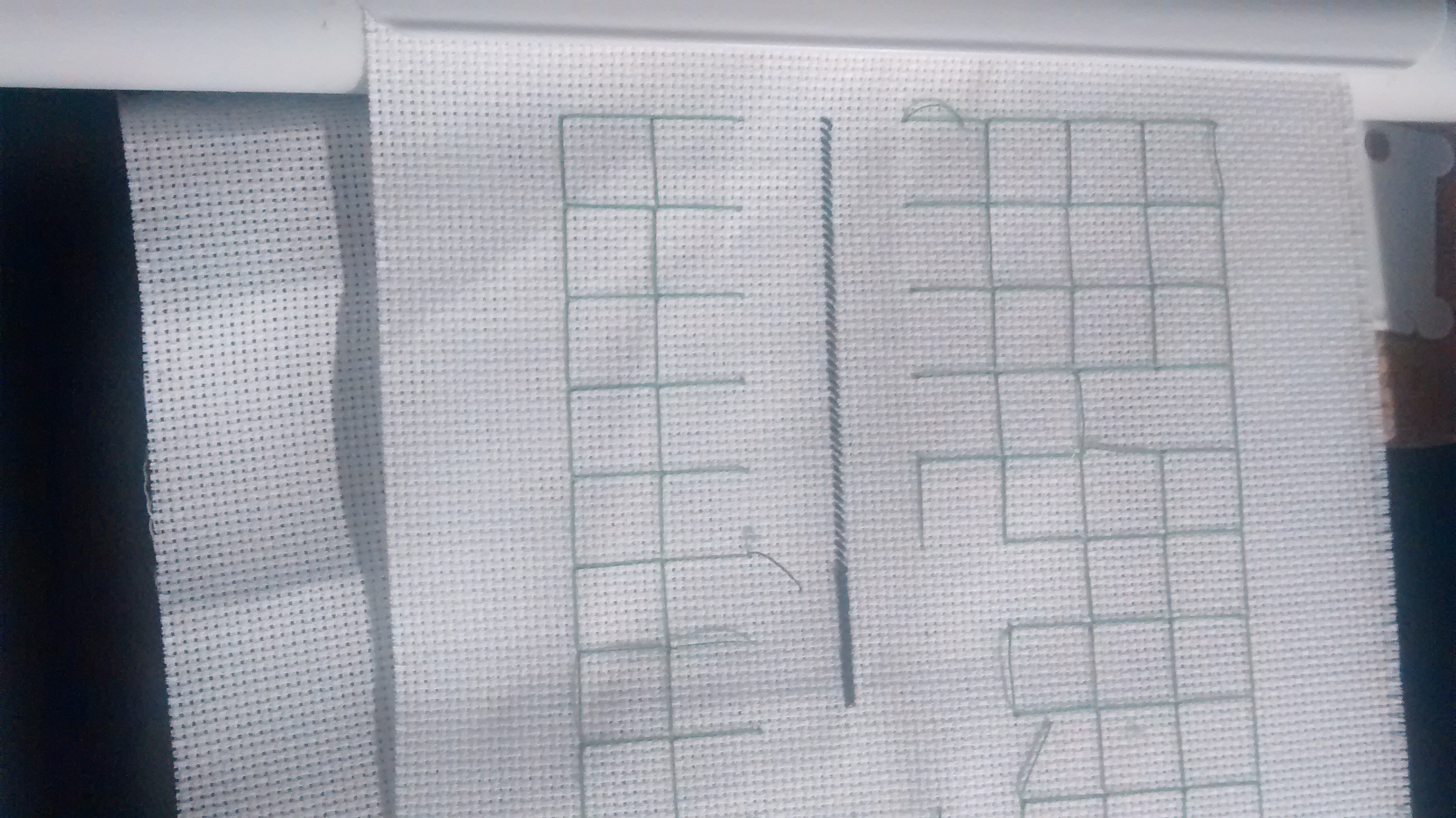 Second session. I removed some of the gridding and started with the beloved 310. I completed all the half stitches on page 1 that goes across the whole piece.