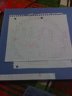 Create your pattern. I use graphing paper and a ratio of 4 squares to 1 pixel. You'll also want to find the verticle and horizontal centers to align the picture.