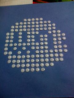 Put in the lightest colored tacs first. Even given plenty of time to dry, the sharpie ink still likes to rub off a little. If you have darker colored ink on your fingers when your putting in the lighter colored ones, you'll likely smudge'em.